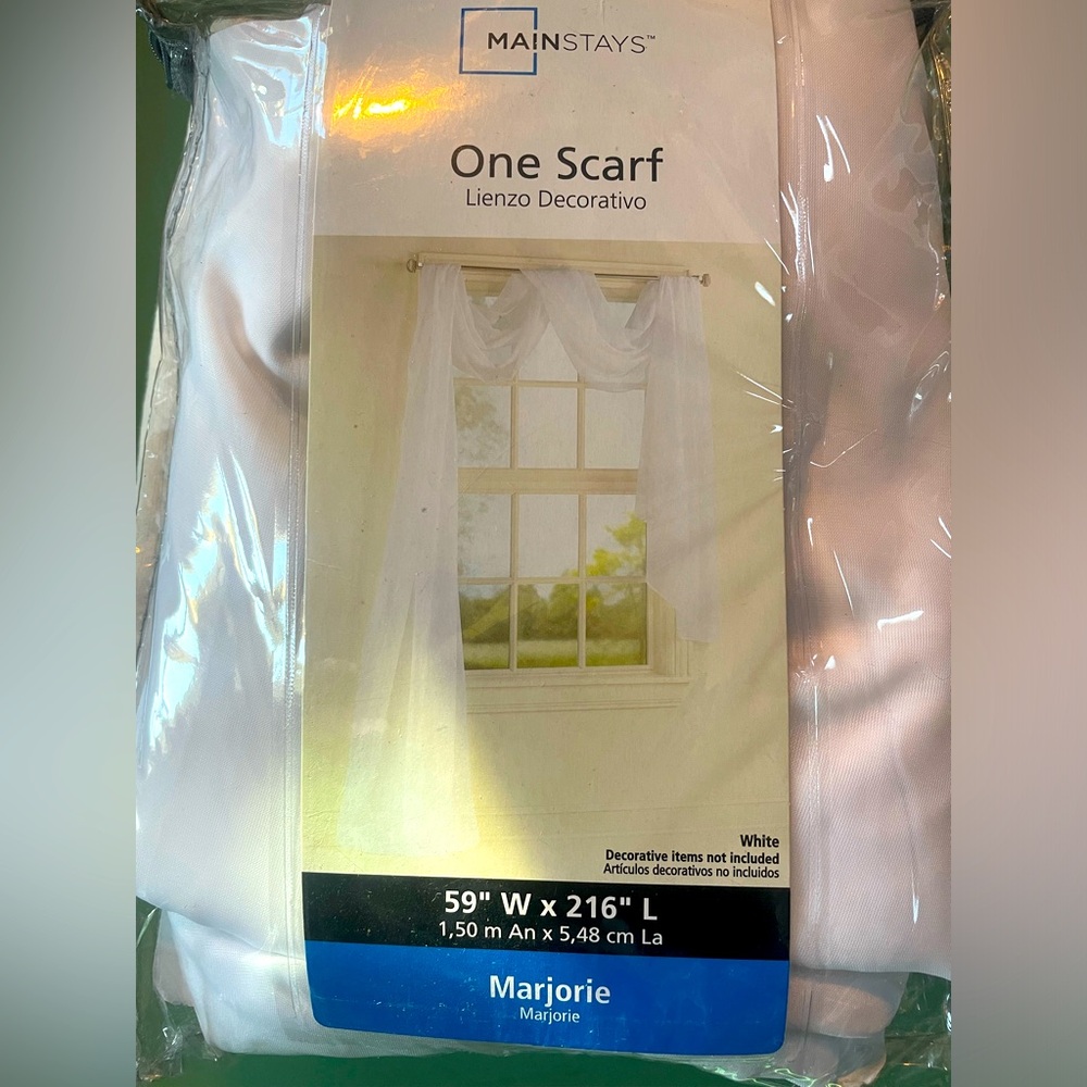 Unused white window drape